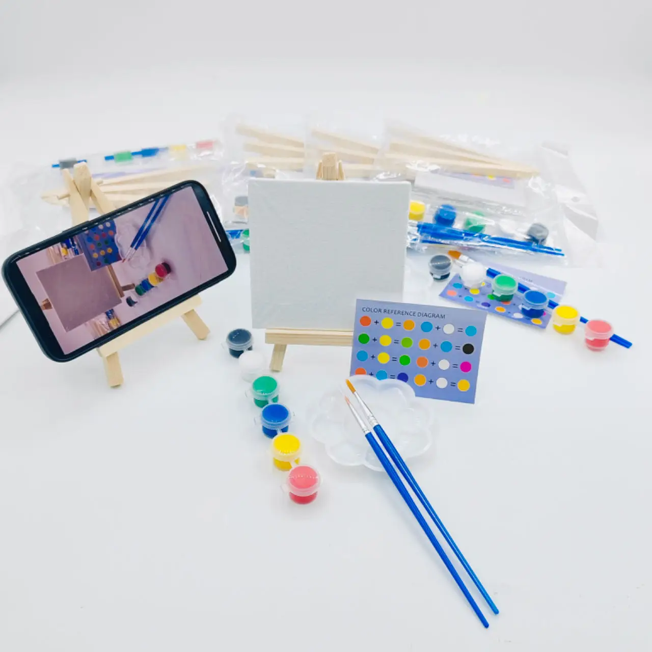 

4 DIY handheld art sets, each set comes with 2 pen brushes, 6 boxes of paint, 1 easel, 1 drawing board, 1 color palette, and 1 c