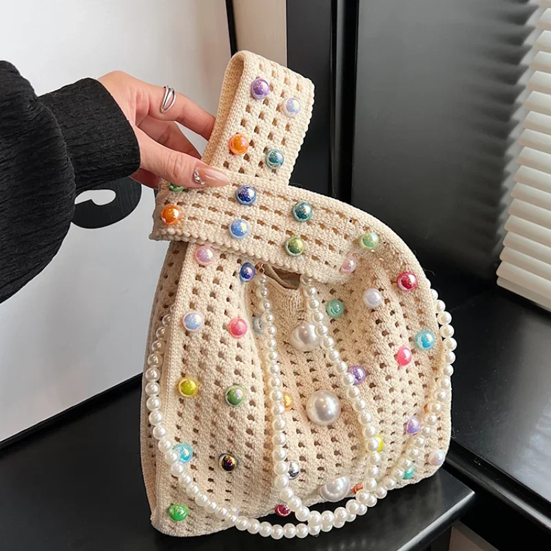 Niche hollow hand carry small bag women's new pearl chain underarm bag messenger bag