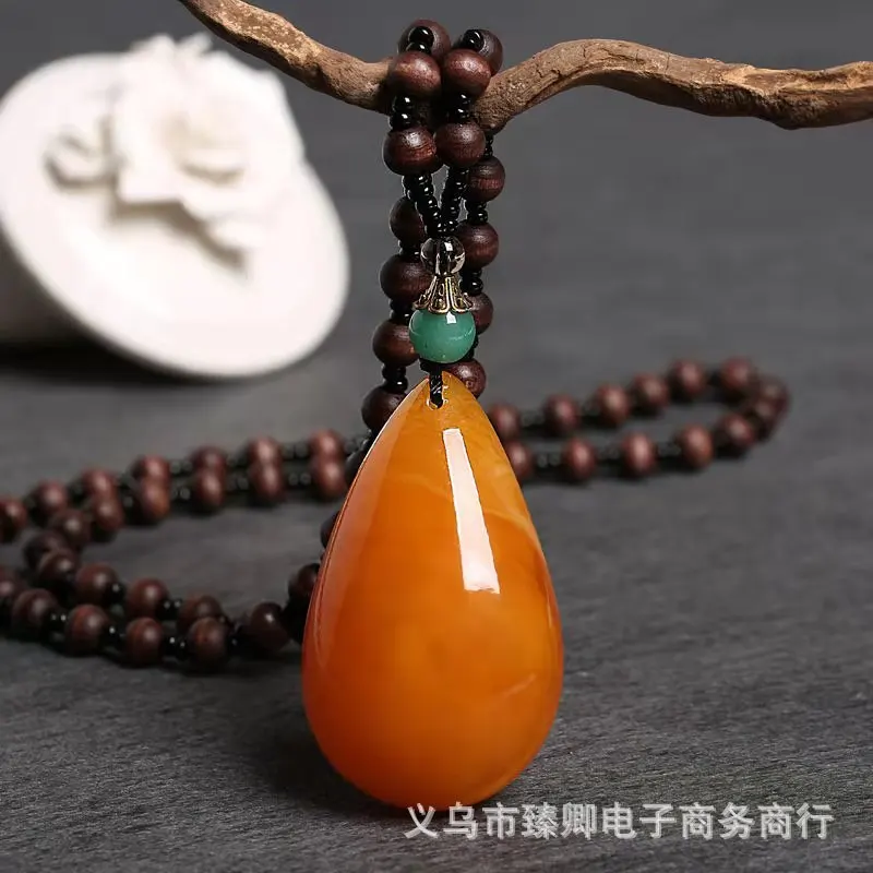 

Retro national wind old beeswax pendant chicken wing wood long necklace women's casual brand sweater chain cotton and linen