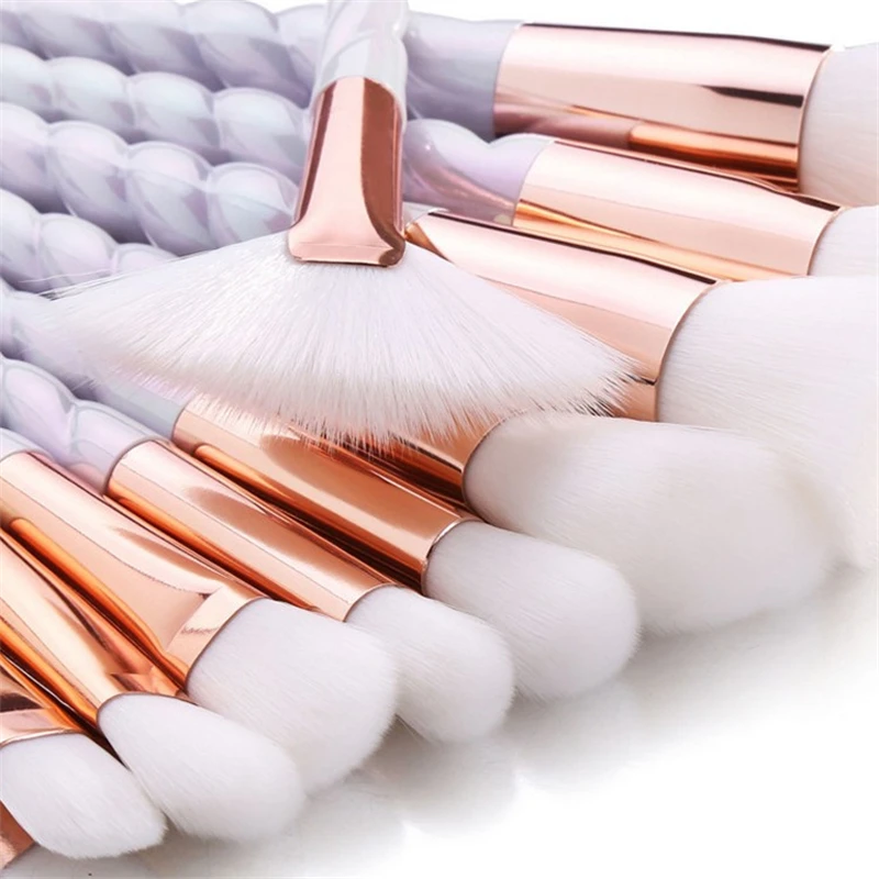 Colorful gradient color spiral handle brush set for applying makeup including a beauty brush for applying blush and a f