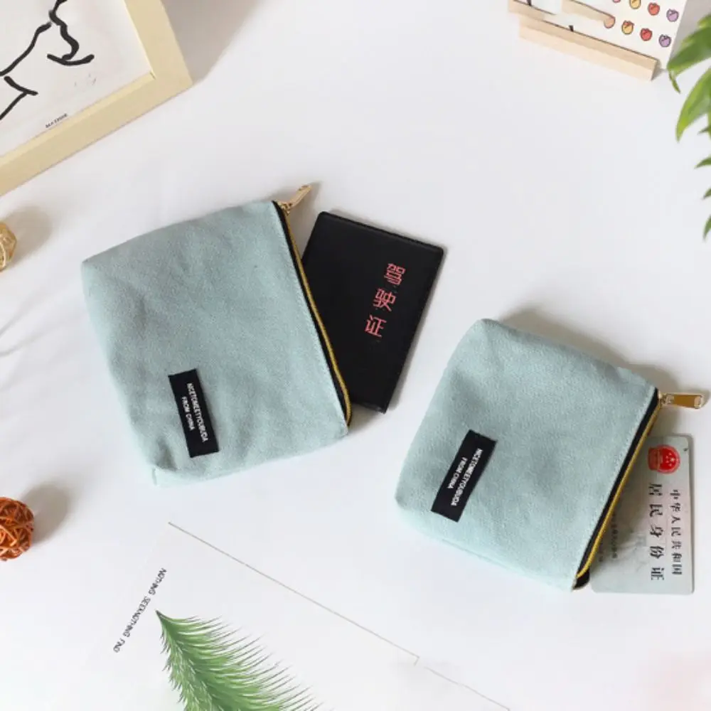 Mini monedero de estilo coreano para mujer, bolsa de cosméticos de lona de Color sólido, bolsa de servilleta sanitaria