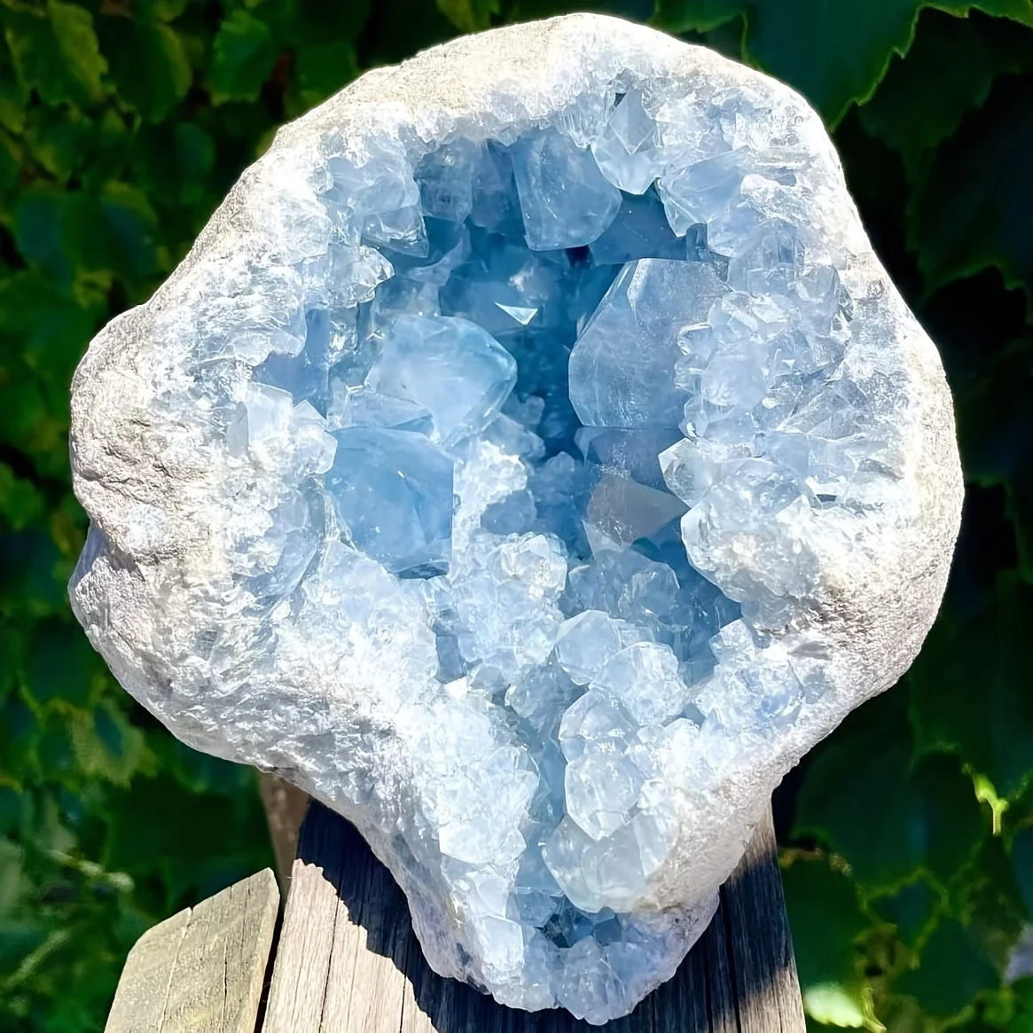 One piece of lapis lazuli rough stone cluster - a sky-blue crystal specimen with a white quartz center and mineral deposits