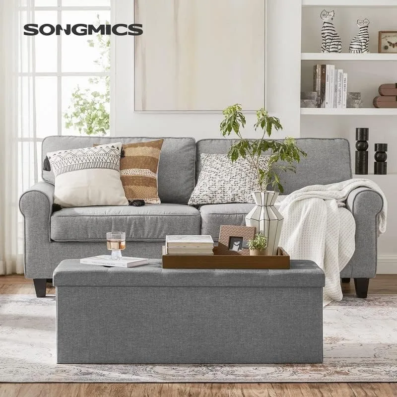 SONGMICS MAZIE Collection - 43 Inches Folding Storage Ottoman Bench,Ottoman Foot Rest,End of Bed Bench,Storage Chest,Load 660 lb