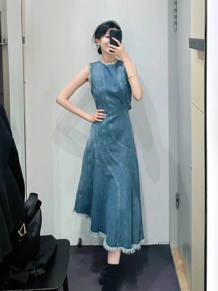 กระโปรงยีนส์สีน้ำเงินสไตล์วินเทจ แต่งผ้าปะติดปะต่อ ทรงเอวสูง ช่วยพรางหุ่น สไตล์เกาหลี เหมาะสำหรับใส่ไปเที่ยวทะเลหรือไปทำงาน  ฤดูใบไม้ผลิ 2025