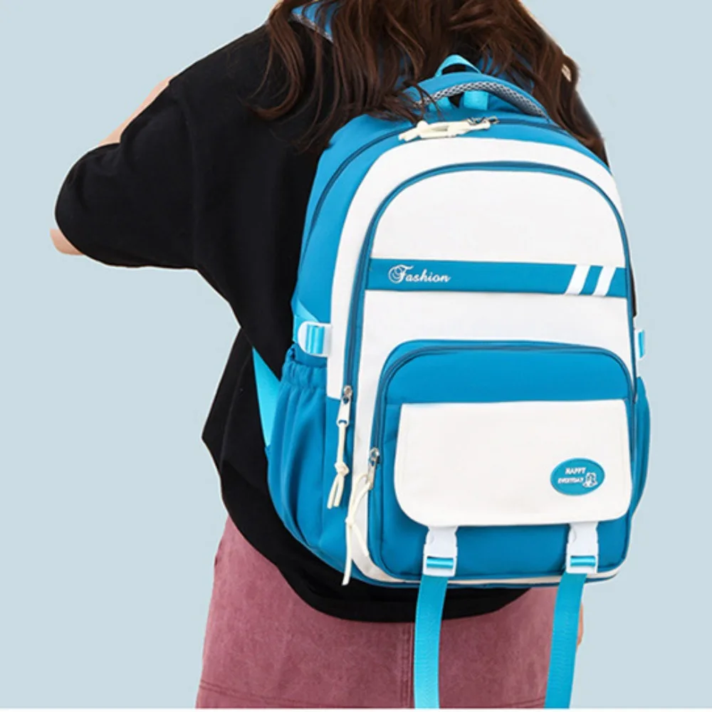 กันน้ําเด็กโรงเรียนกระเป๋าเป้สะพายหลังไนลอนความจุขนาดใหญ่นักเรียนกระเป๋านักเรียนน้ําหนักเบากระเป๋าเป้สะพายหลังโรงเรียนประถมศึกษาชายหญิง