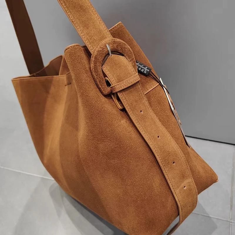 Bolsas de couro genuíno coreanas para mulheres bolsas e bolsas de grife de luxo 2024 novas em couro de vaca de grande capacidade com bolso interno bolsa de ombro nas axilas alta qualidade Frete grátis Envio rápido cheg