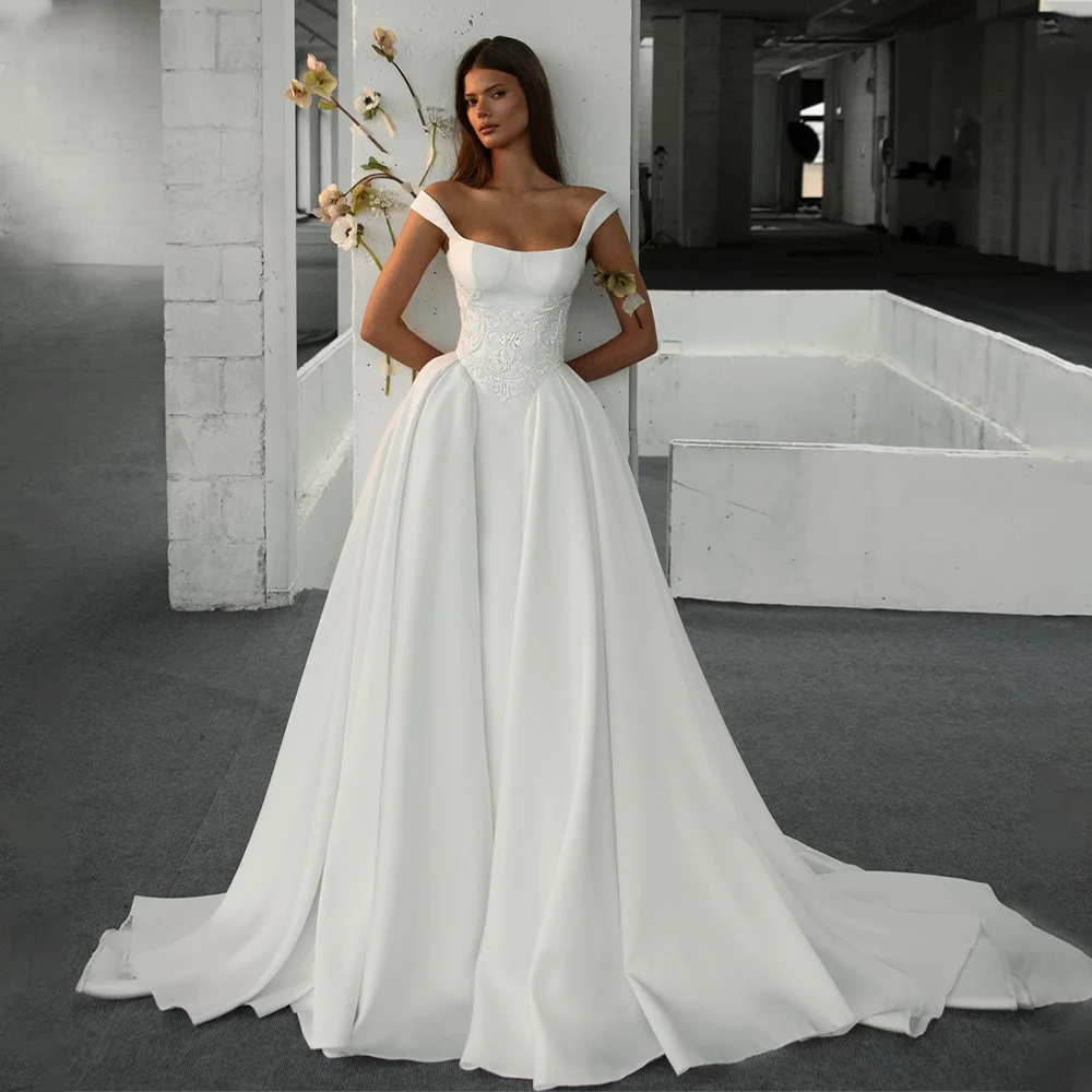 

Роскошные атласные свадебные платья трапециевидной формы с двумя бретелями и кружевной аппликацией, свадебные платья с скользящим шлейфом на заказ, 2026 Rode De Morri