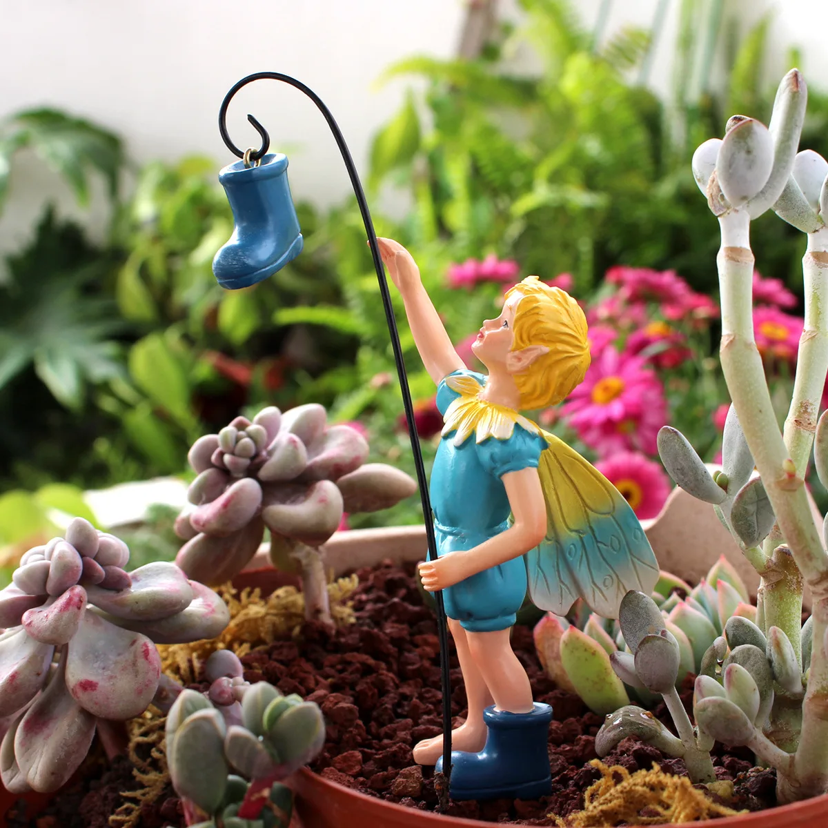 

‌Resin Garden Boy with Shoes - Outdoor Planter Accent‌