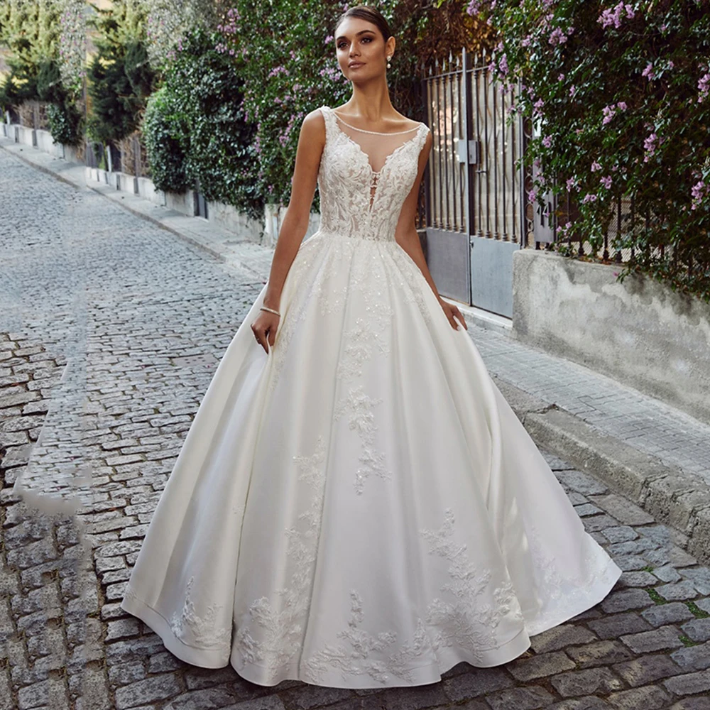 Romantic Wedding Dresses for Woman Sexy Backless Round Neck Sleeveless A-line Lace Bride Gown Spaghetti Strap فستان الزفاف