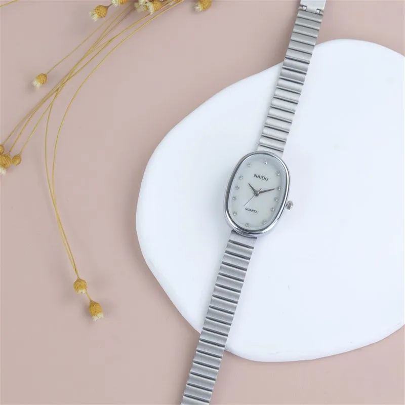 Hot Sale Oval Beautiful Ladies Watches For Women Girl Simple Silver and Gold Alloy Watchband Quartz Minimalist Wristwatches