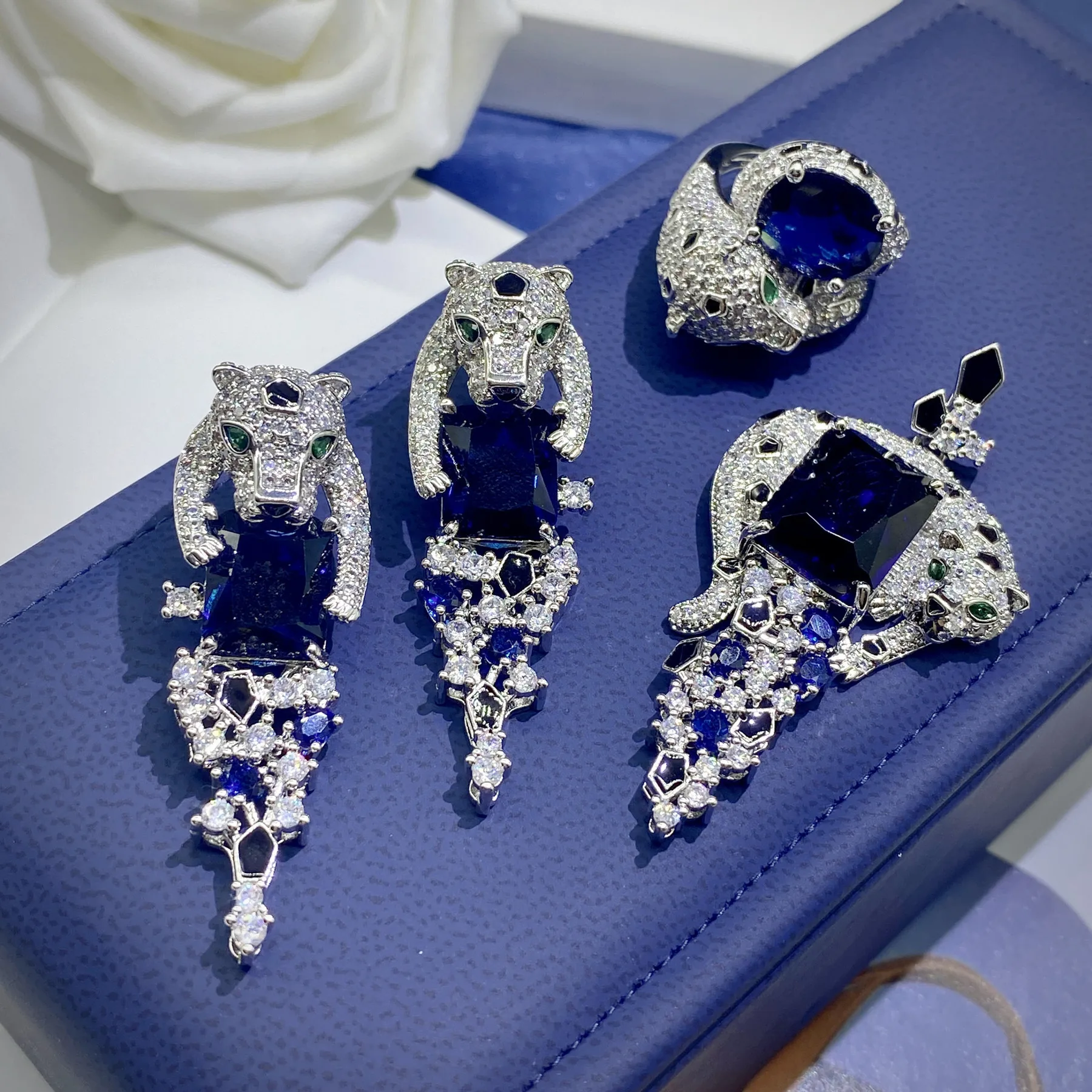 

Blue Panther Set - Sapphire Earrings, Emerald Ring & Diamond Pendant