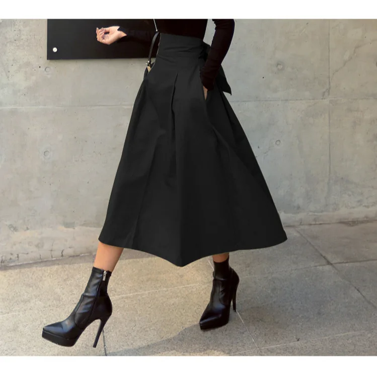 Gonna a trapezio autunnale a vita alta e snellente con cravatta Bowknot Gonna ombrello coreana versatile in tinta unita con grande altalena per le donne