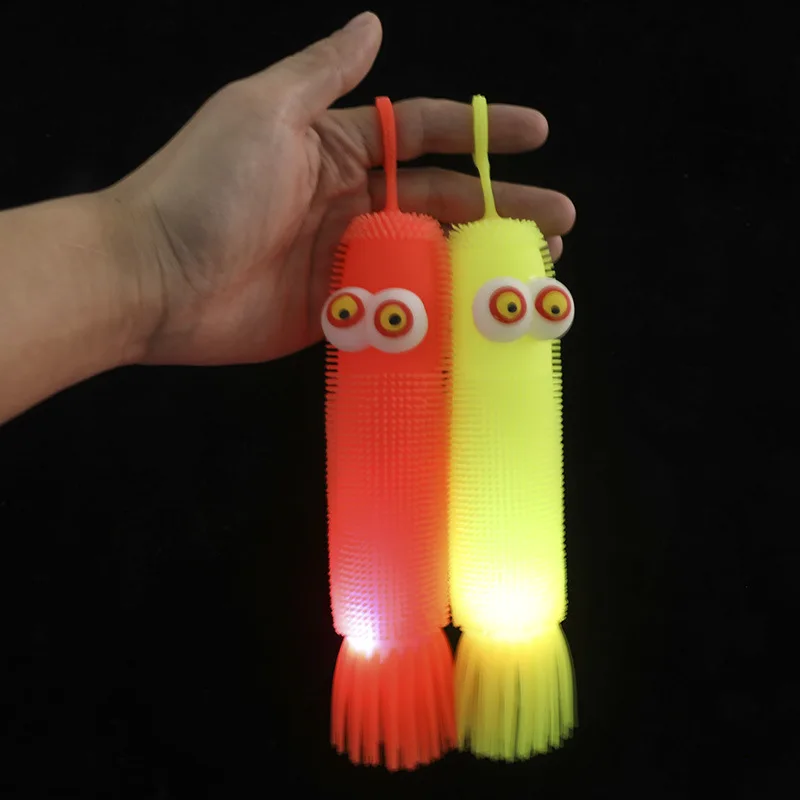 1 randomly colored glowing corn caterpillar octopus balloon toy, 23cm soft TPR sensory squeeze toy, foldable stress relieving