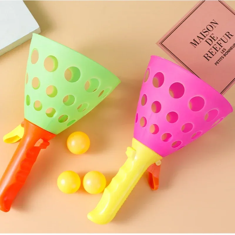 Un par de juguetes deportivos de plástico para niños, pelota de catapulta doble, pelotas de lanzamiento para padres e hijos, juguete interactivo, juego de guardería al aire libre