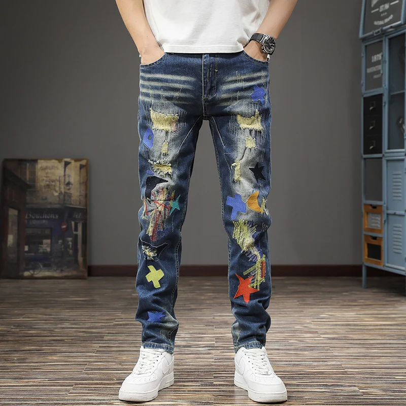 

Spring and autumn new fashion washed embroidered jeans pants men slim feet personality beggar patch hole straight leg pants tide