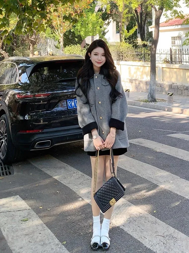 Elegant black and white diagonal mid length jacket college style color block collar gold single breasted women\'s fashion coat