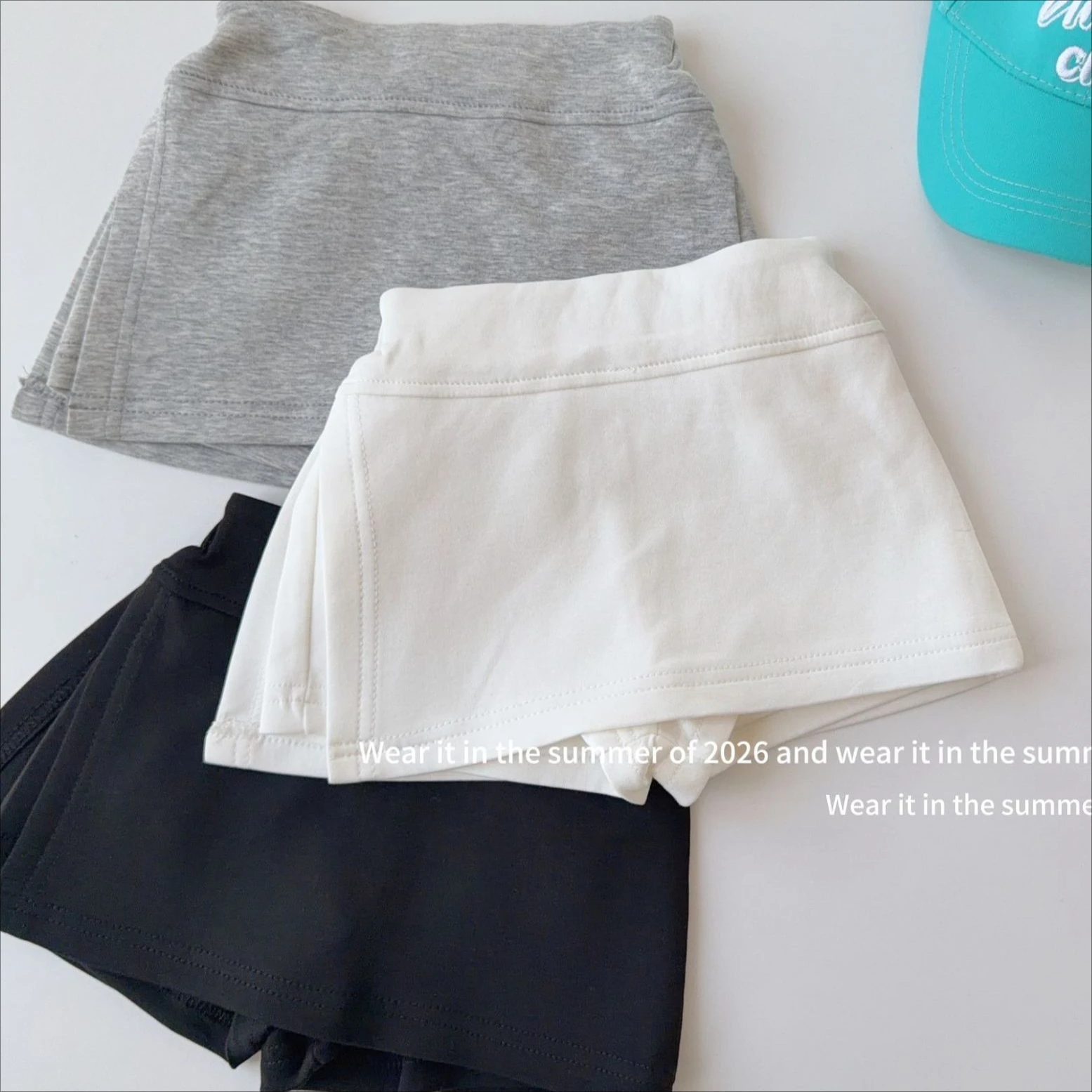 saia-infantil-feminina-2026-primavera-verao-nova-colecao-roupa-infantil-estilo-coreano-saia-esportiva-casual-com-fenda-e-cintura-alta-para-meninas