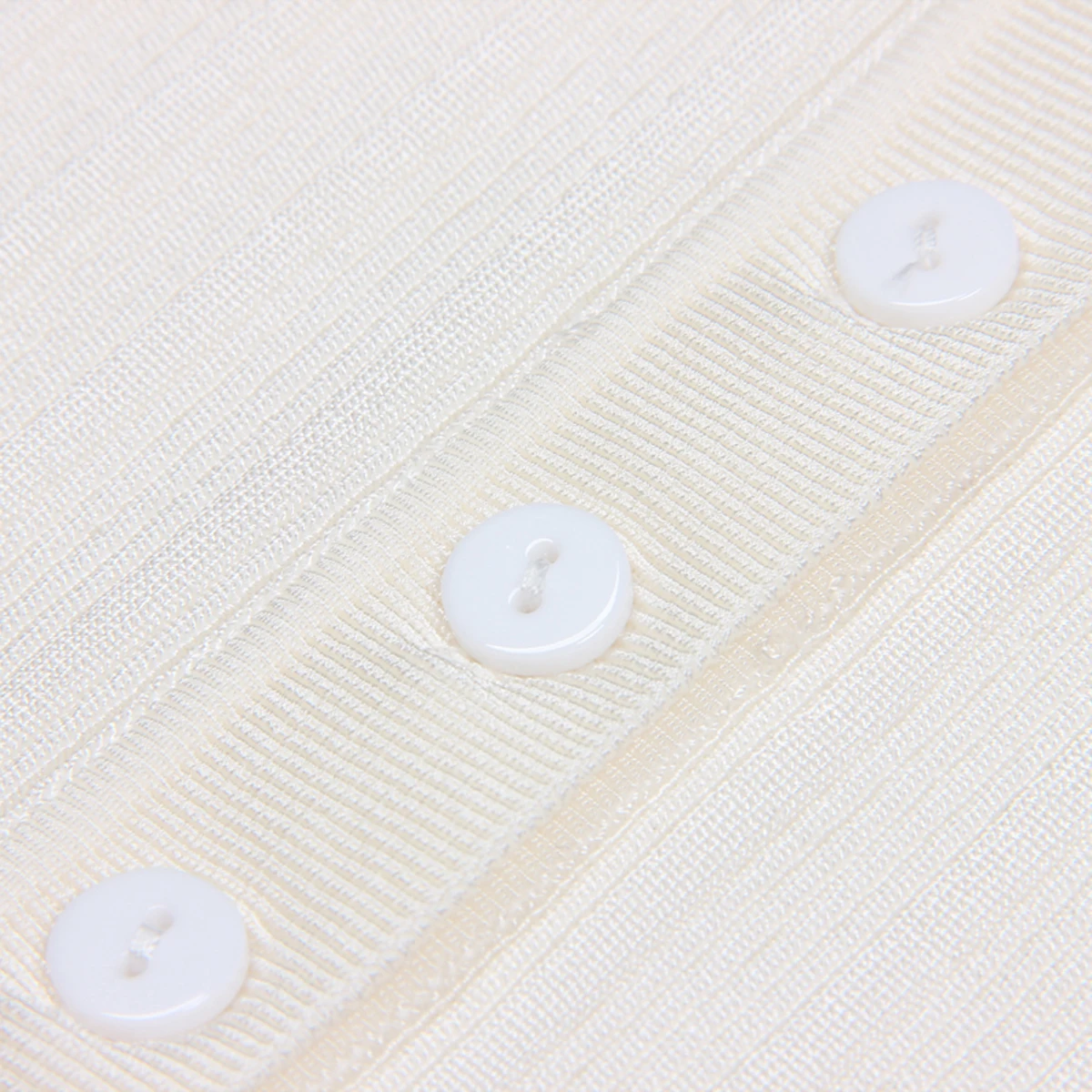 Primavera y otoño nuevo estilo moda temperamento viajero alta calidad hielo seda tejido manga larga cuello cárdigan Top Coat