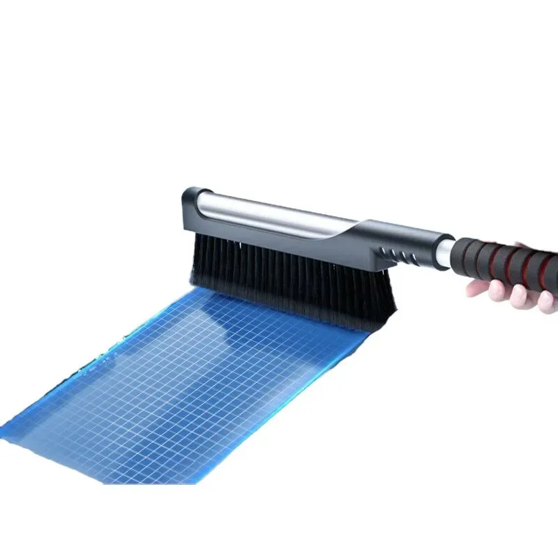 

Snow shovel car with snowplow brush to defrost snow winter window glass tool to de-ice