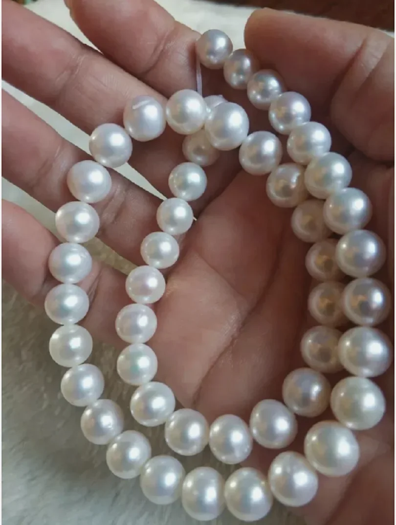 

20 inch AAAA 10-11mm round white Japanese Akoya pearl necklace in 14K gold