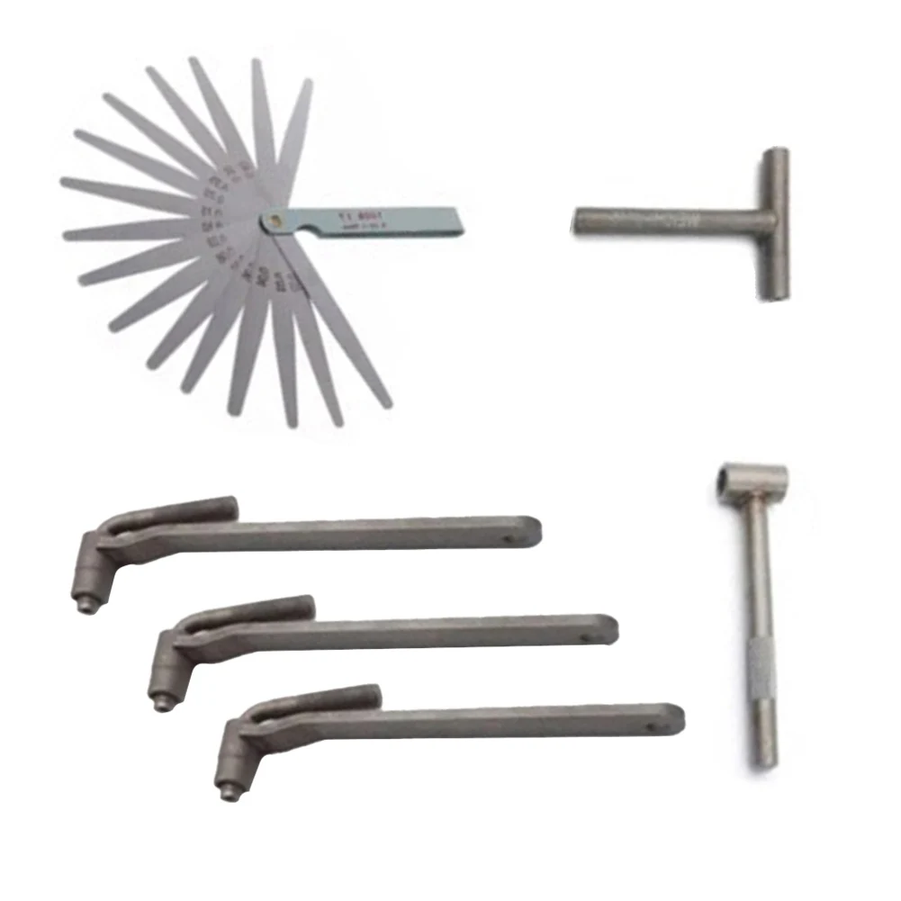 

Innovative Motorcycle Engine Tune Up Toolkit Six Essential Pieces Including Varied Size Wrenches & a Gauging Tool