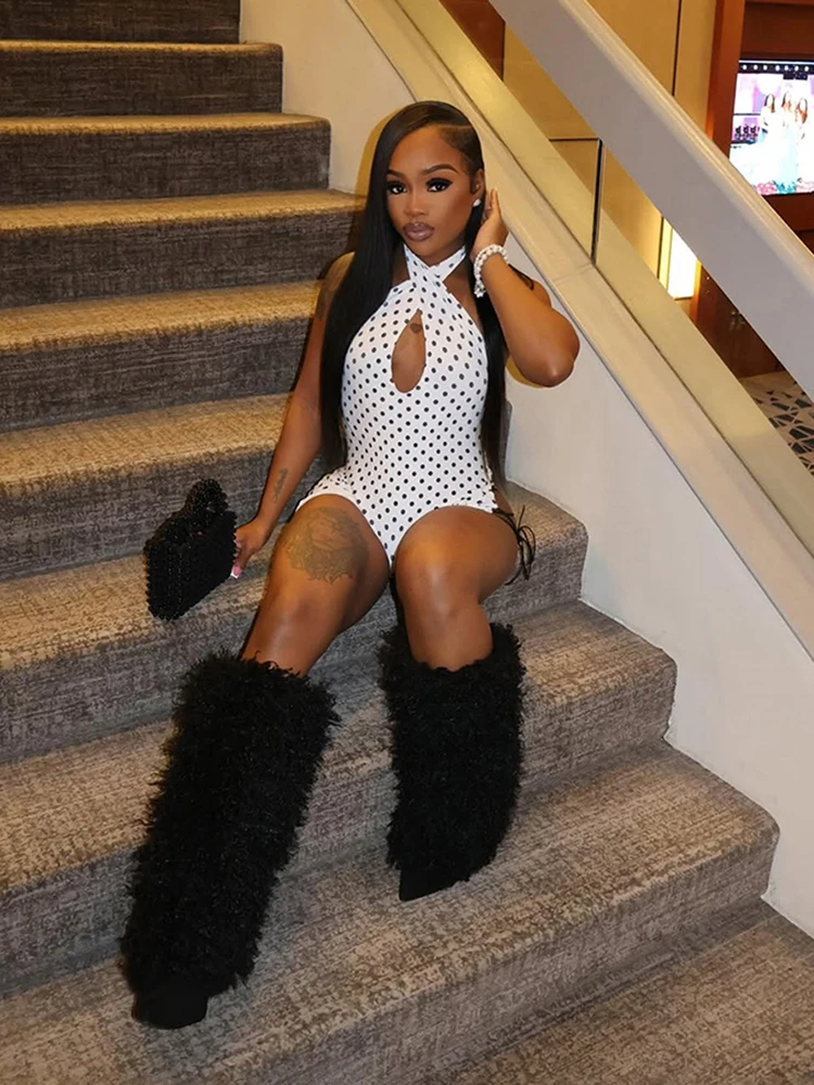 Kliou セクシーな中空デザインのプレイスーツ女性用水玉模様プリントホルターバックレスノースリーブスキニーピーチヒップミッドナイトクラブパーティーロンパース