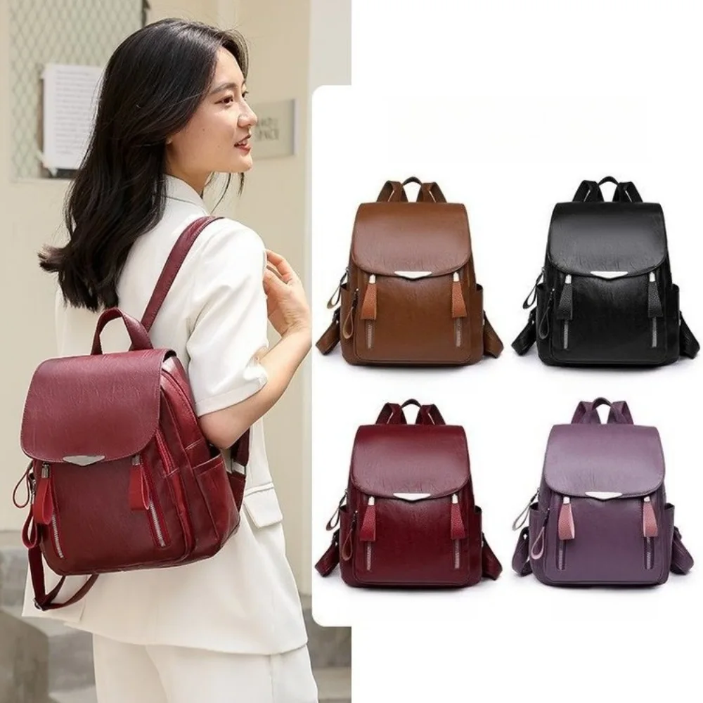 PU leather student schoolbag with large capacity flip cover, simple design, suitable for ladies, water-resistant travel backpack