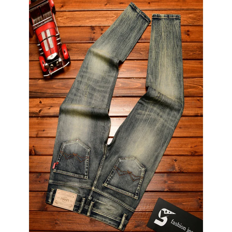 

Высококачественные мужские джинсы в стиле ретро, приталенный крой на маленьких ножках, модная американская уличная мужская одежда, осенние эластичные потертые брюки 2025 года.