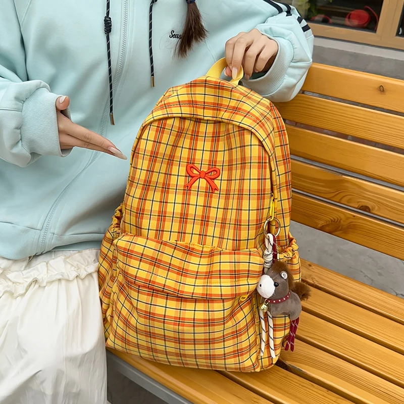 

Women's Yellow Orange Plaid Canvas Backpack Embroidery Bowknot Plush Charm Adjustable Strap Casual Daily School Bag 2026 New