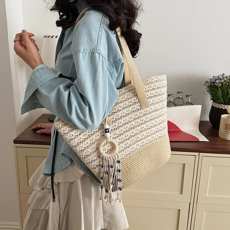 

Handwoven bag women's 2026 summer seaside vacation beach wind large capacity tote bag braided shoulder bucket bag