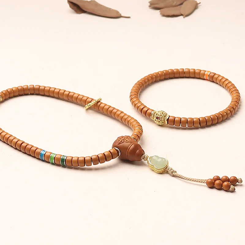 braccialetto-portafortuna-con-perle-di-oliva-intagliate-naturali-connettore-coassiale-a-tre-vie-charm-avvolgente-portafortuna