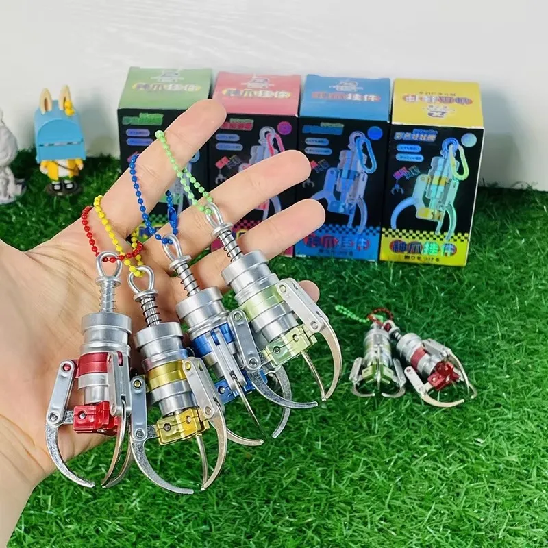 Chaveiro Criativo Tipo Máquina de Garra de Simulação Miniatura para Captura de Bonecos, Chaveiro de Descompressão para Mochila