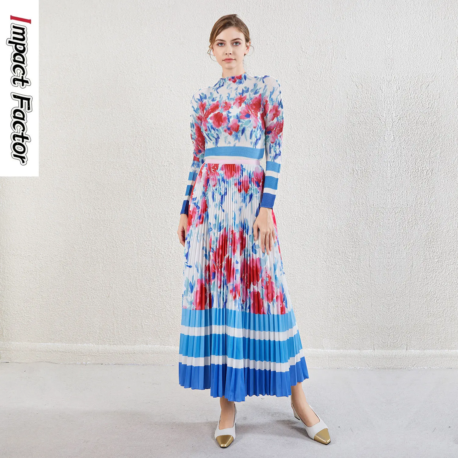 

2025 commuter suit women's new Miyake printed long-sleeved slim-fitting pleated top big pendulum skirt two-piece set