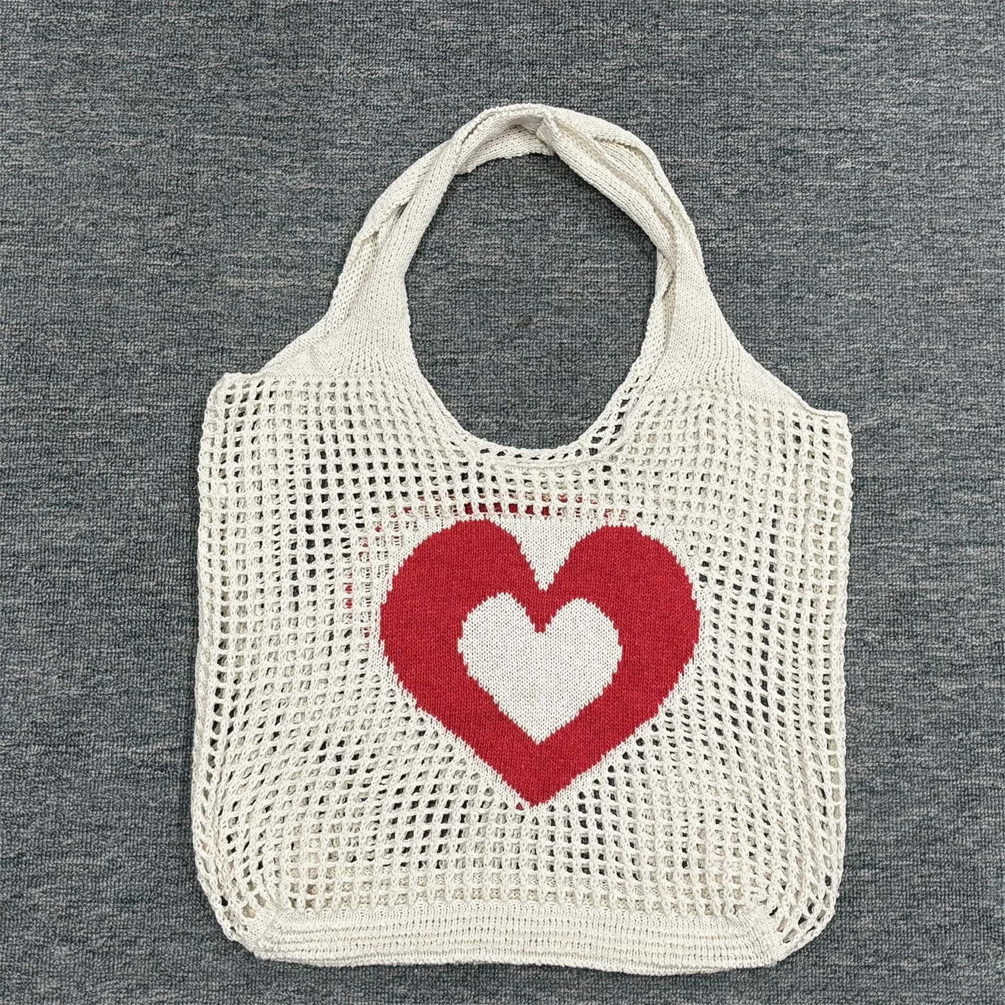 حقيبة يد نسائية عصرية محبوكة بنمط قلب مع فتحة واسعة وتصميم مجوف للحصول على أقصى قدرة