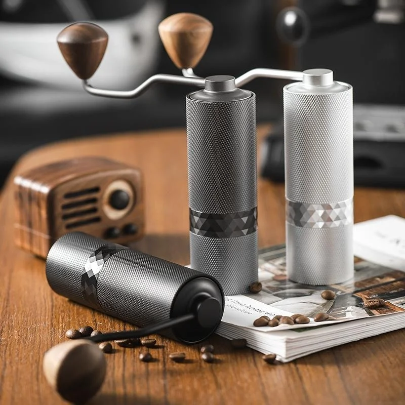 moulins-a-cafe-manuels-outil-professionnel-pour-barista-mecanisme-revetu-de-titane-fonctionnement-ultra-silencieux-design-minimaliste-portable-2026