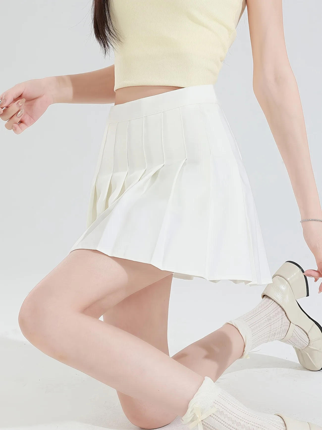 Schwarzer Y2K High-Waist Plissee-Minirock für Damen, A-Linie JK-Stil, Reißverschlussrock mit integrierten Sicherheitsshorts, Sommermode – Detail 9