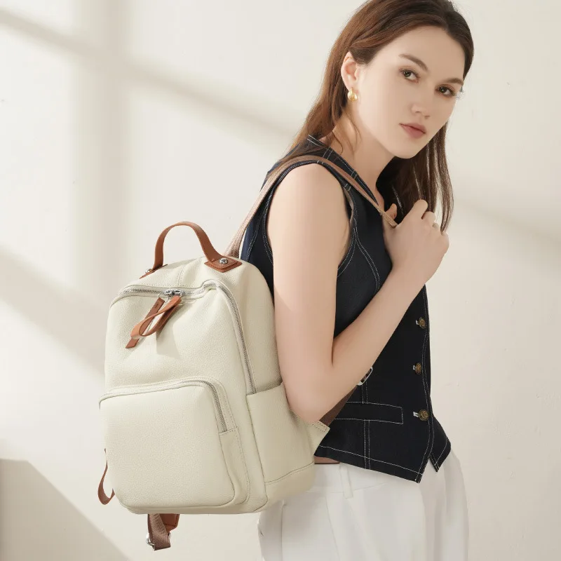 Real leather large-capacity computer backpack with dual straps, multiple pockets, women's high-end travel bag