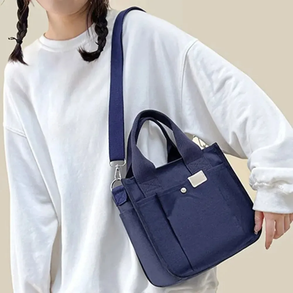 

Multi-pocket Japanese Style Crossbody Bag Handheld Large Capacity Canvas Shoulder Bag Mommy Bag All-match Solid Color Tote Bag