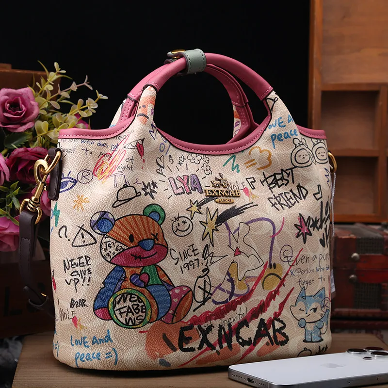 Vintage and Luxury Handheld Tote Bag with Classic Contrast Color and Delicate Bear Graffiti Women's Popular Single Shoulder Bag
