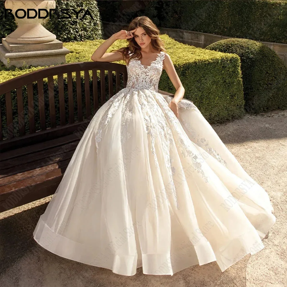 RODDRSY V-Neck mangas Applique Vestidos De Casamento A Linha Tulle Boho Vestidos De Novia Lace Backless Custom Made Vestidos De NoivaRODRSY V-Neck mangas Applique Vestidos de Noiva A Linha Tulle Boho Vestidos De Novia