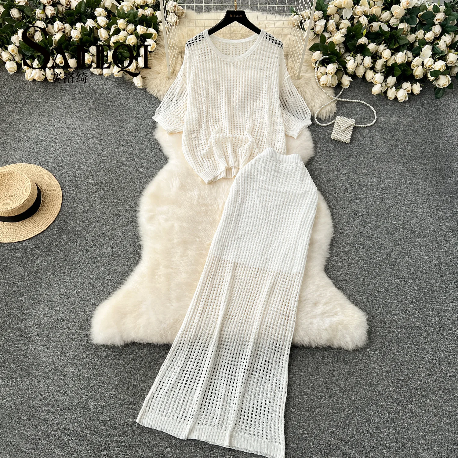 

Lazy wind suit loose pullover knit top hollowed out high-waisted long half-body skirt two-piece set