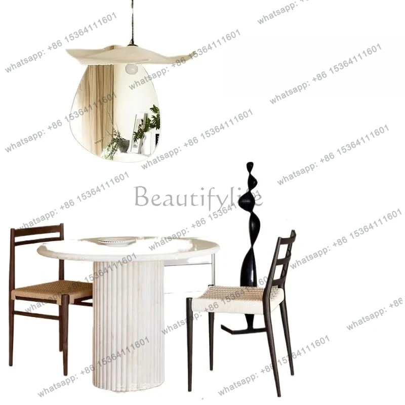 

Natural marble wabi sand travertine imported dining table living room household round light luxury high-end dining table