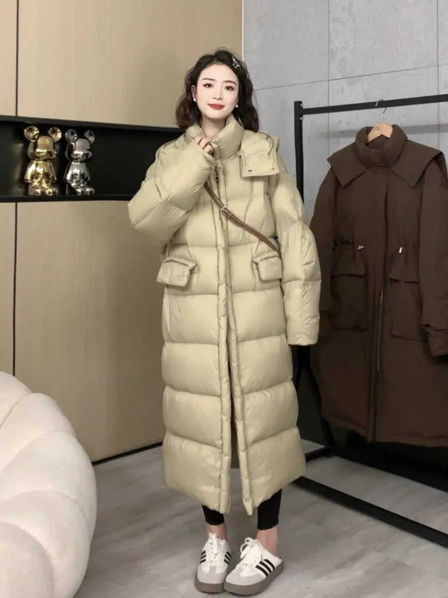 Minimalist ische lange Daunen jacke im koreanischen Stil für Frauen im Winter, beliebte kleine und modische weiße Daunen jacke