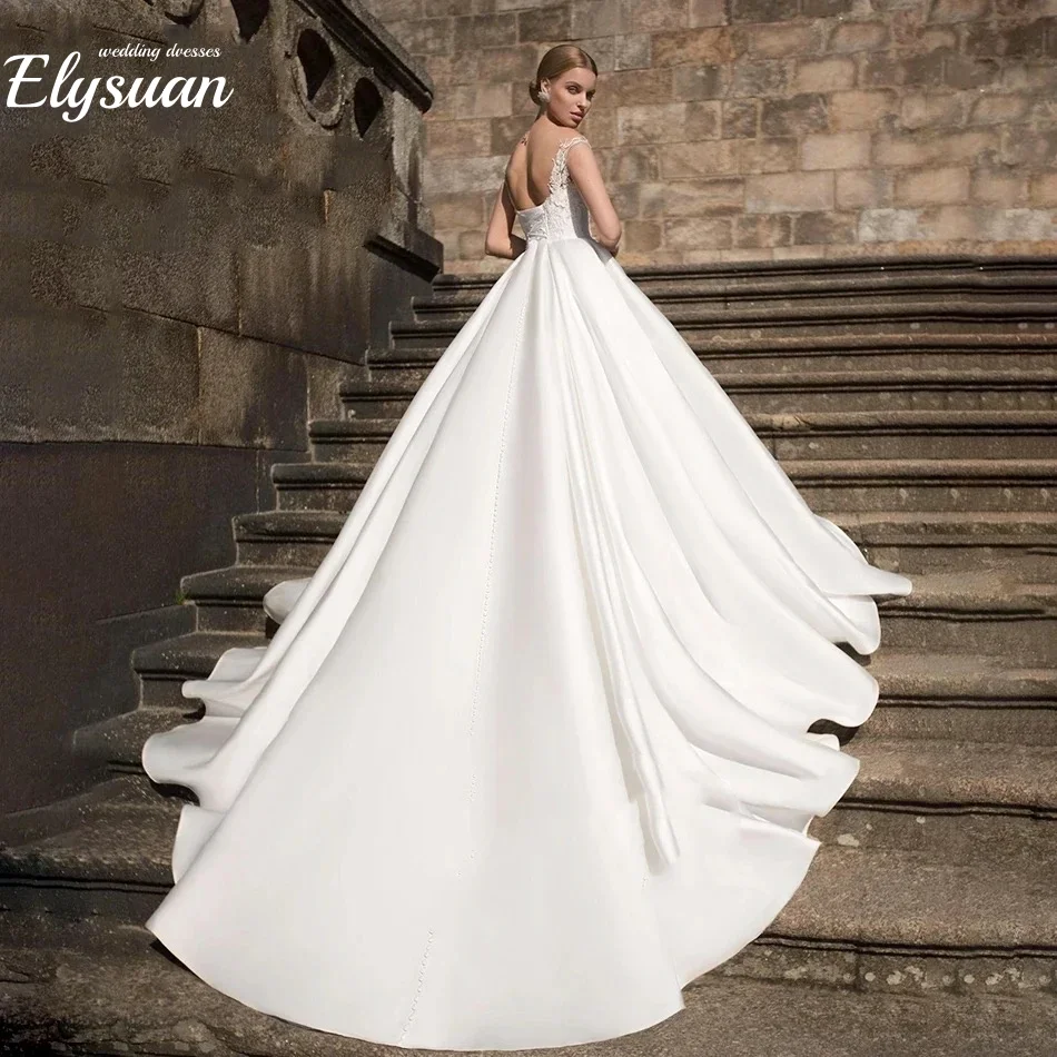 ชุดแต่งงานแบบเปิดไหล่ทรงเอไลน์ประดับลูกไม้หรูหราสำหรับเจ้าสาว