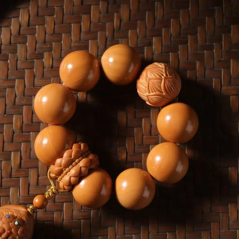 Monkey full round bead stress-relieving bracelet with carved design