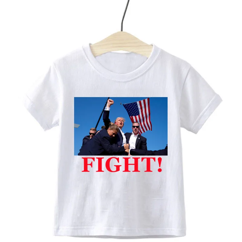 President Donald Trump argues with photos after children's t-shirt shot at his rally Trump Rally Shooter Tshirt