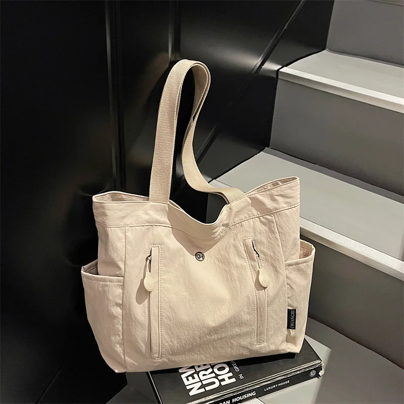 

New Korean Style Canvas Tote Shoulder Bag Large Capacity Commuter Handle Bag for Women Texture Simple and Versatile Storage Bags