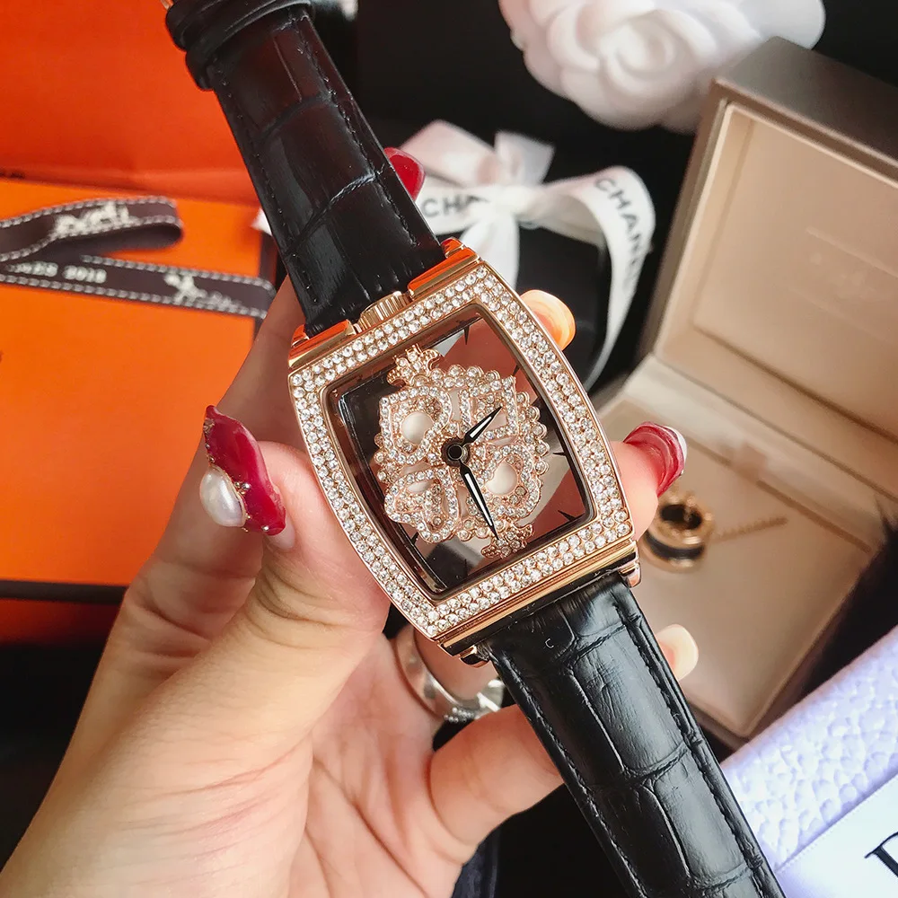 New tonneau-shaped skeletonized watch with a transparent rotating dial, elegant style for women, perfect as a gift.
