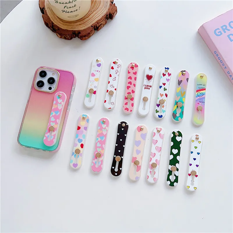 Heart Shape Wrist Band Hand Finger Grip Mobile Phone Holder Stand Push Pull Phone Socket Ring Holder Grip Belt For Iphone 15