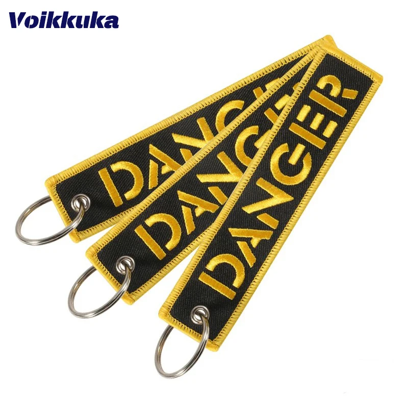 1PC 2PCS 3PCS Set Sale Golden Warning Golden Danger Both Sides Embroidery Black Cloth Tag Keychain Motorcycle Key Accessories